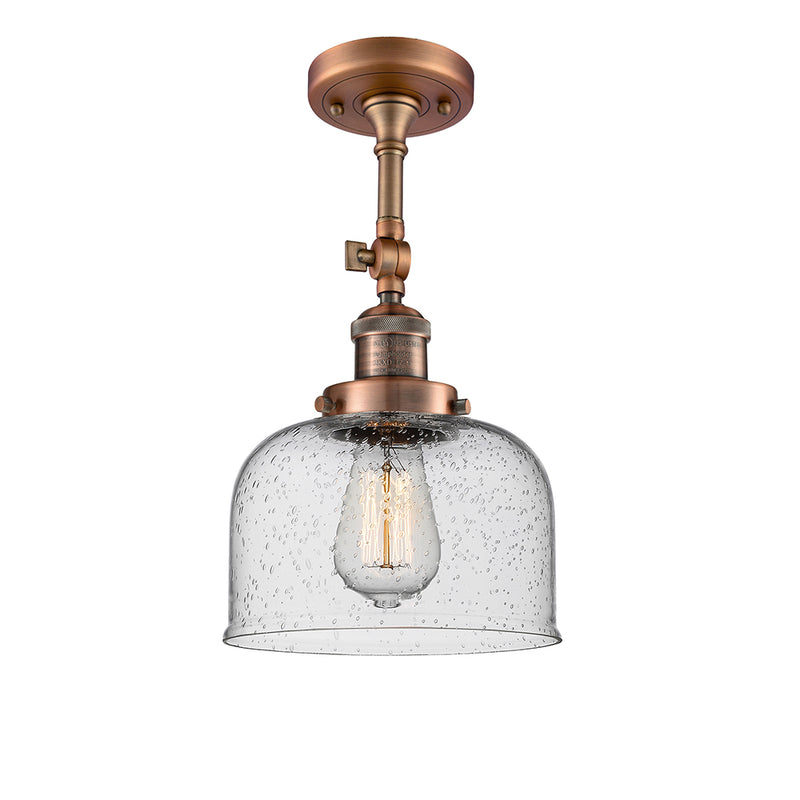 Bell Semi-Flush Mount shown in the Antique Copper finish with a Seedy shade