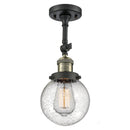 Beacon Semi-Flush Mount shown in the Black Antique Brass finish with a Seedy shade