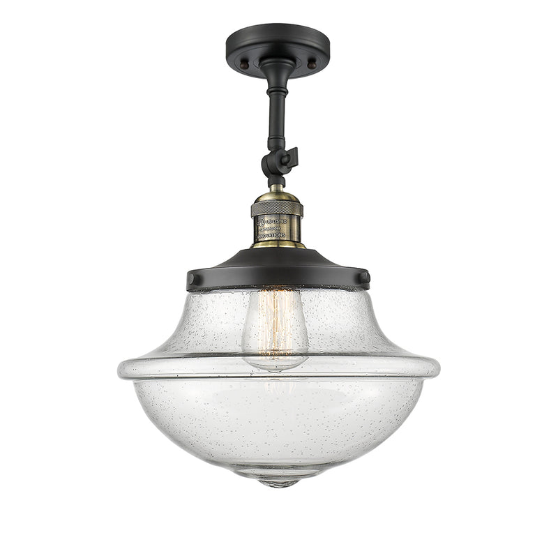 Oxford Semi-Flush Mount shown in the Black Antique Brass finish with a Seedy shade