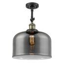 Bell Semi-Flush Mount shown in the Black Antique Brass finish with a Plated Smoke shade