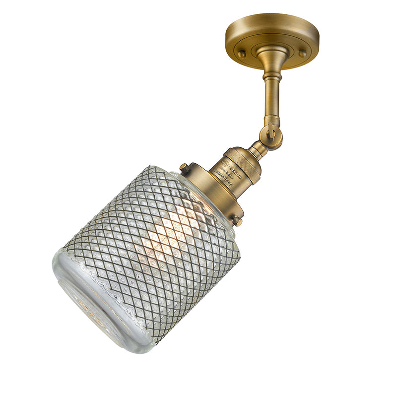 Stanton Semi-Flush Mount shown in the Brushed Brass finish with a Clear Wire Mesh shade