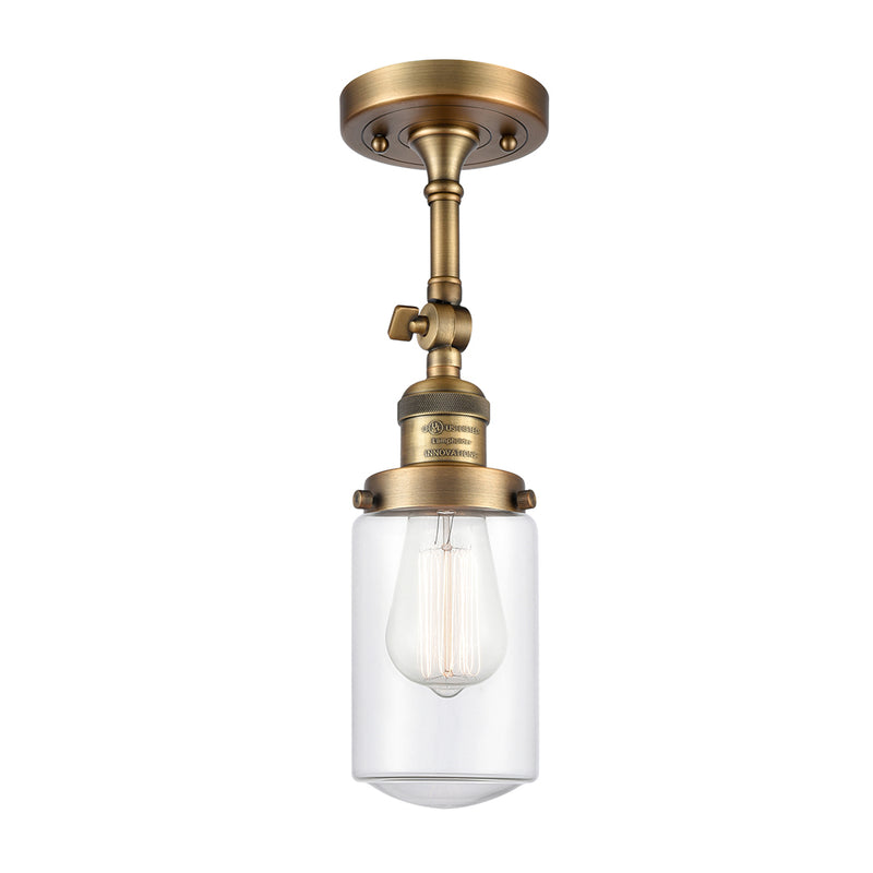 Dover Semi-Flush Mount shown in the Brushed Brass finish with a Clear shade