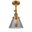 Cone Semi-Flush Mount shown in the Brushed Brass finish with a Plated Smoke shade