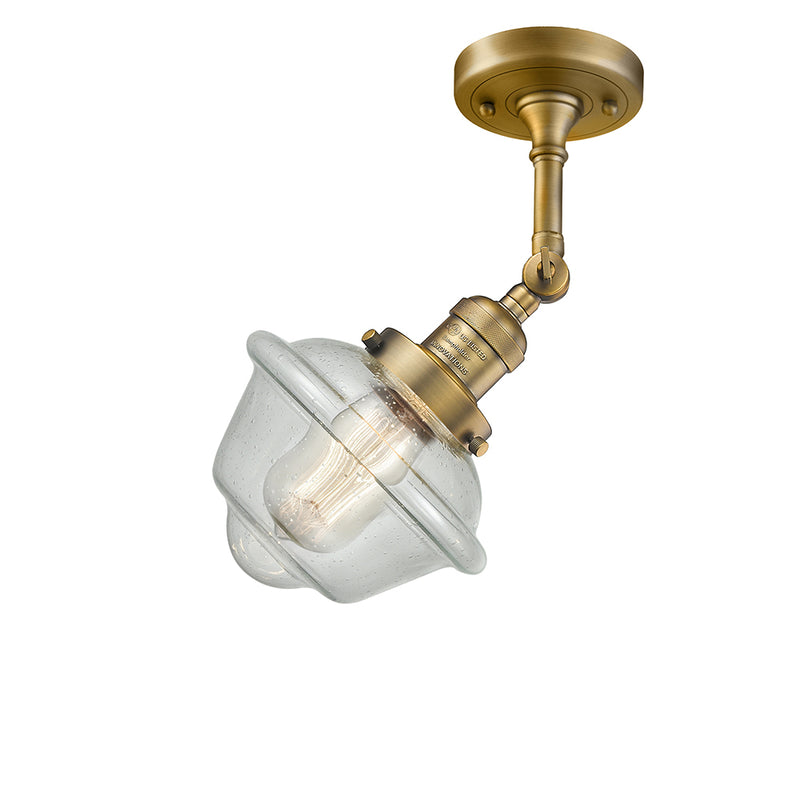 Oxford Semi-Flush Mount shown in the Brushed Brass finish with a Seedy shade