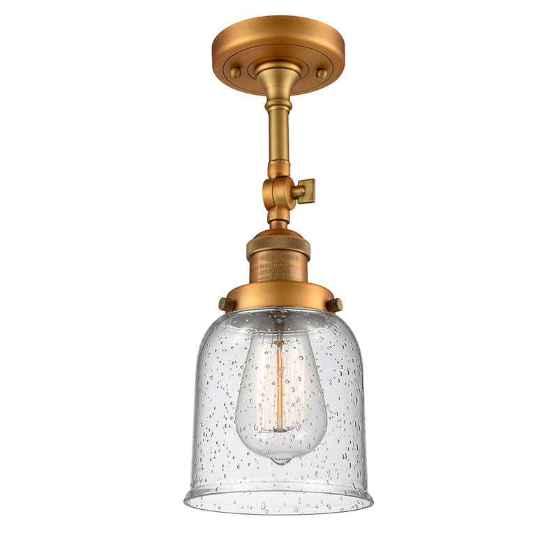 Bell Semi-Flush Mount shown in the Brushed Brass finish with a Seedy shade