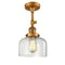 Bell Semi-Flush Mount shown in the Brushed Brass finish with a Clear shade