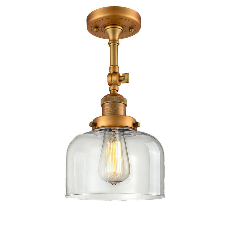 Bell Semi-Flush Mount shown in the Brushed Brass finish with a Clear shade