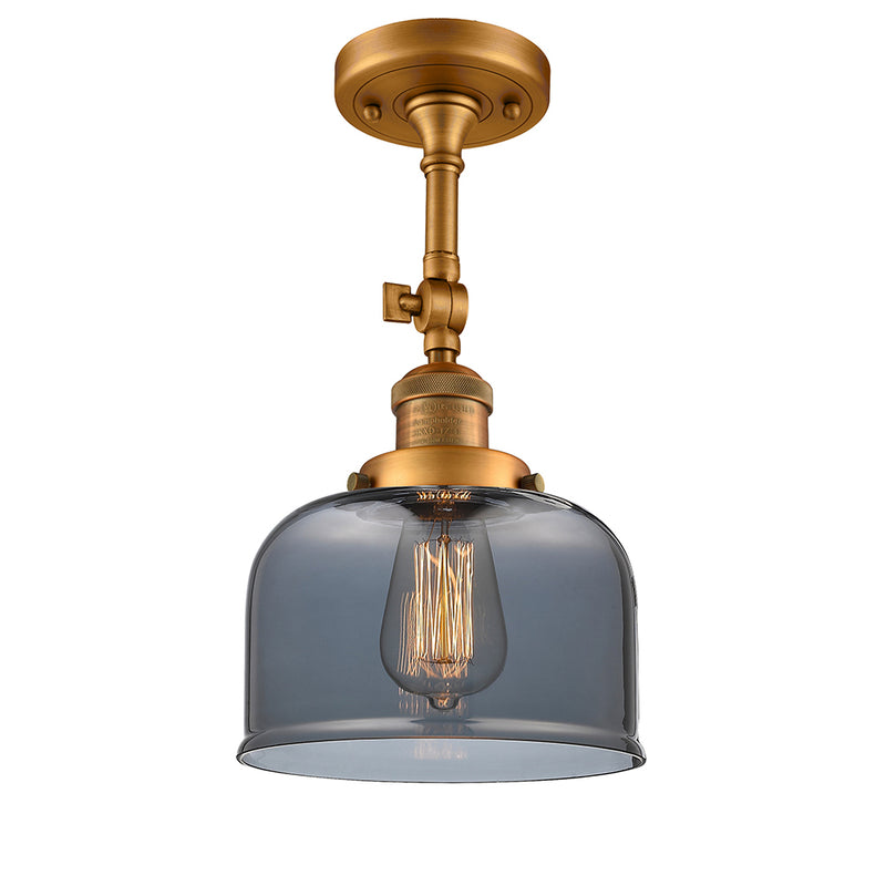 Bell Semi-Flush Mount shown in the Brushed Brass finish with a Plated Smoke shade