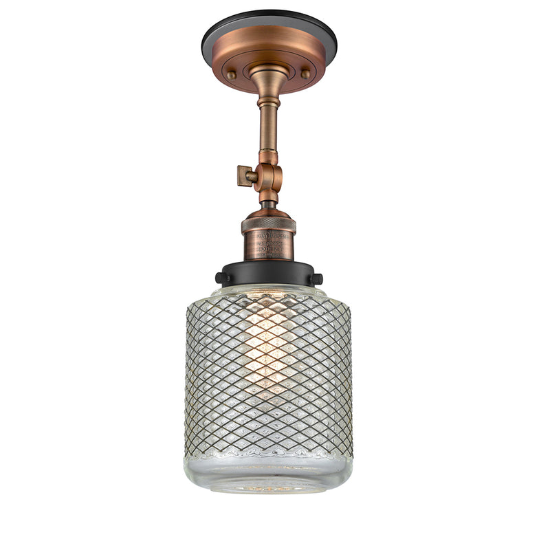 Stanton Semi-Flush Mount shown in the Antique Copper finish with a Clear Wire Mesh shade