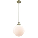 Beacon Mini Pendant shown in the Antique Brass finish with a Matte White shade