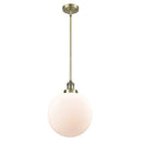 Beacon Mini Pendant shown in the Antique Brass finish with a Matte White shade