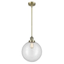 Beacon Mini Pendant shown in the Antique Brass finish with a Clear shade