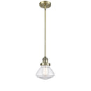 Olean Mini Pendant shown in the Antique Brass finish with a Clear shade