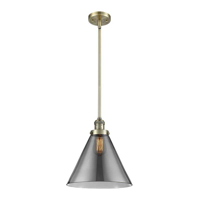 Cone Mini Pendant shown in the Antique Brass finish with a Plated Smoke shade