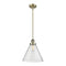 Cone Mini Pendant shown in the Antique Brass finish with a Seedy shade