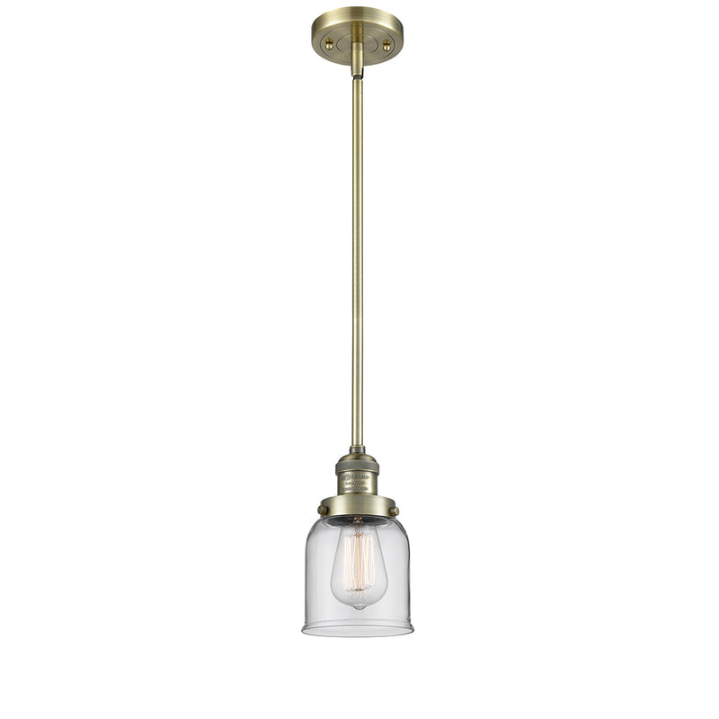 Bell Mini Pendant shown in the Antique Brass finish with a Clear shade