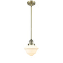 Oxford Mini Pendant shown in the Antique Brass finish with a Matte White shade