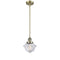 Oxford Mini Pendant shown in the Antique Brass finish with a Clear shade