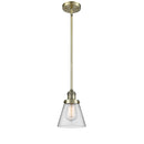 Cone Mini Pendant shown in the Antique Brass finish with a Clear shade