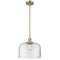 Bell Mini Pendant shown in the Antique Brass finish with a Clear shade