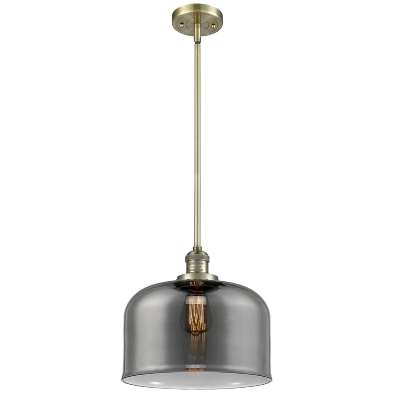 Bell Mini Pendant shown in the Antique Brass finish with a Plated Smoke shade