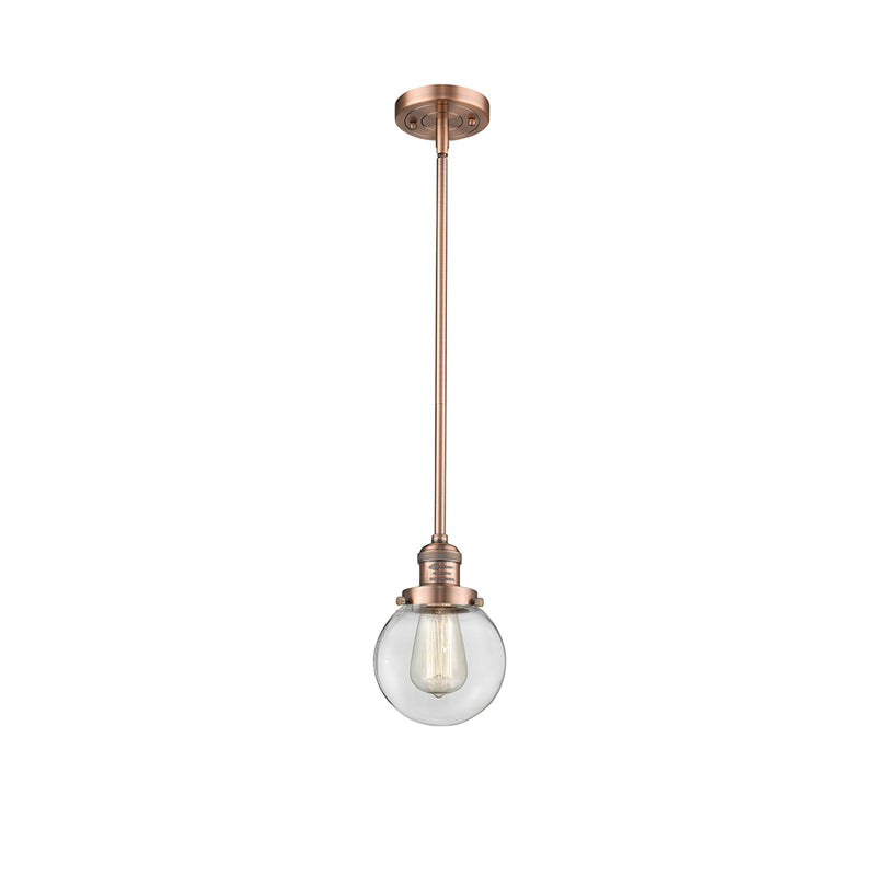 Beacon Mini Pendant shown in the Antique Copper finish with a Clear shade