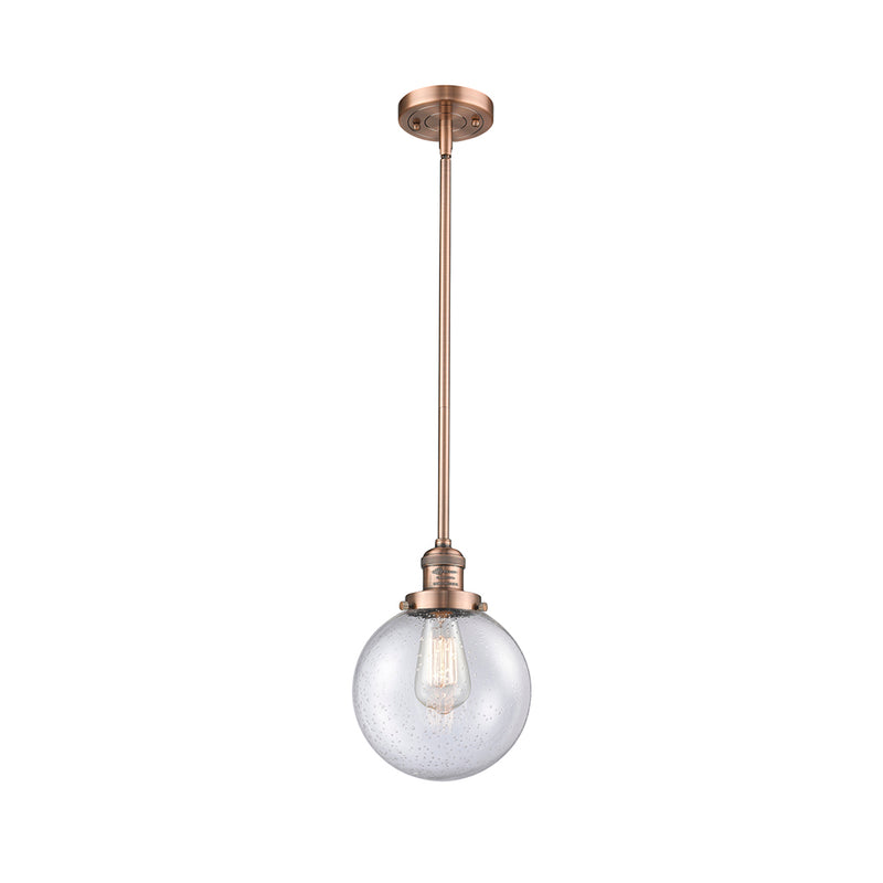 Beacon Mini Pendant shown in the Antique Copper finish with a Seedy shade