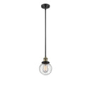 Beacon Mini Pendant shown in the Black Antique Brass finish with a Seedy shade