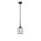 Bell Cage Mini Pendant shown in the Black Antique Brass finish with a Matte White shade