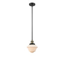 Oxford Mini Pendant shown in the Black Antique Brass finish with a Matte White shade