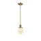 Beacon Mini Pendant shown in the Brushed Brass finish with a Matte White shade