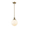 Beacon Mini Pendant shown in the Brushed Brass finish with a Matte White shade