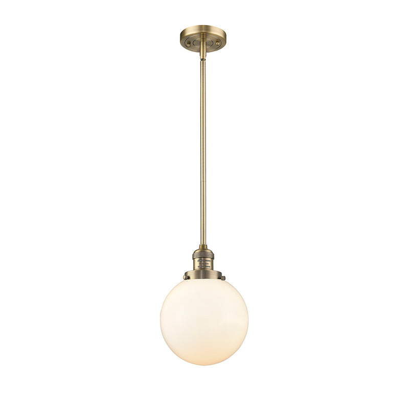 Beacon Mini Pendant shown in the Brushed Brass finish with a Matte White shade