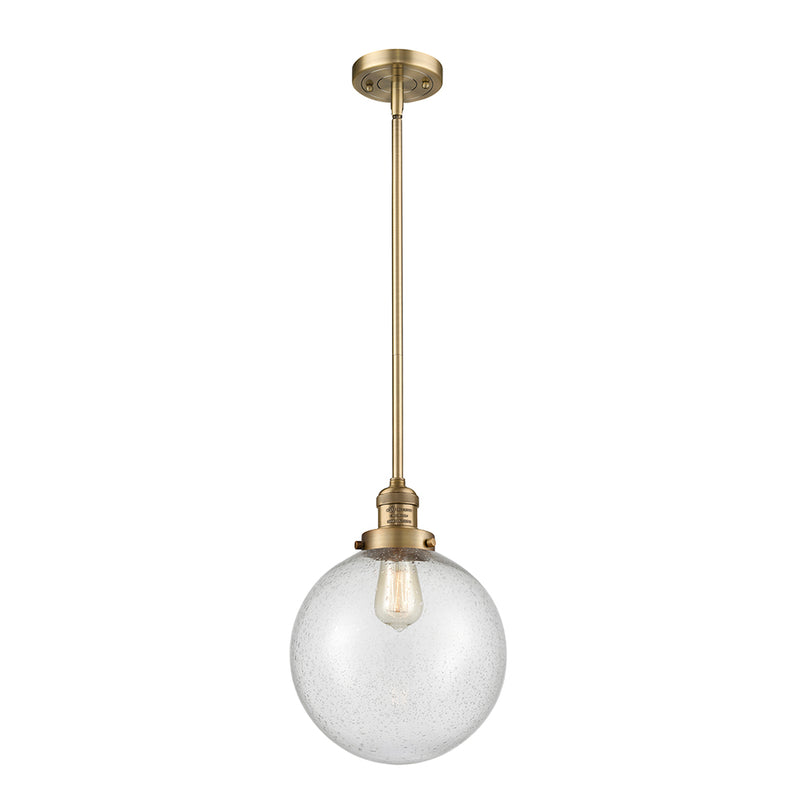 Beacon Mini Pendant shown in the Brushed Brass finish with a Seedy shade