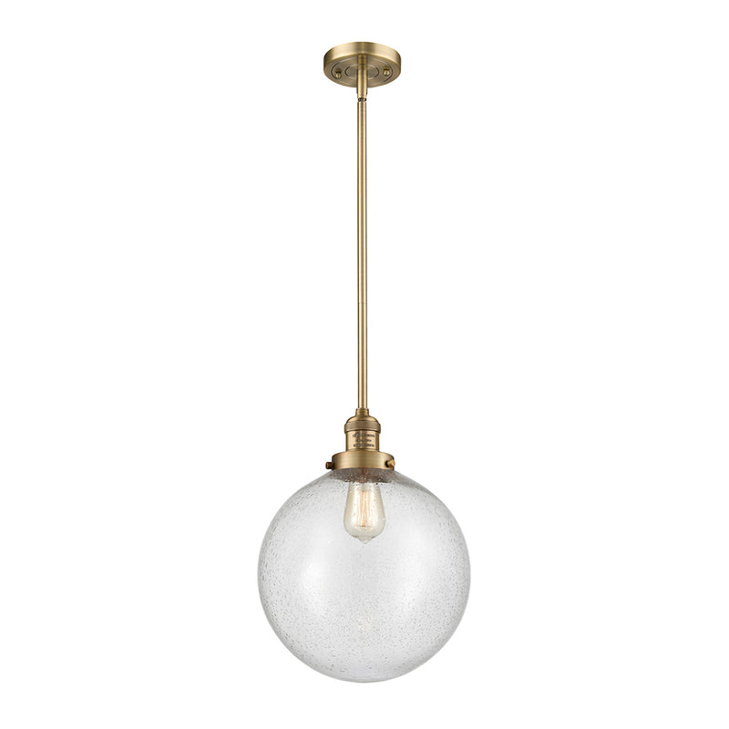 Beacon Mini Pendant shown in the Brushed Brass finish with a Seedy shade