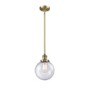 Beacon Mini Pendant shown in the Brushed Brass finish with a Seedy shade