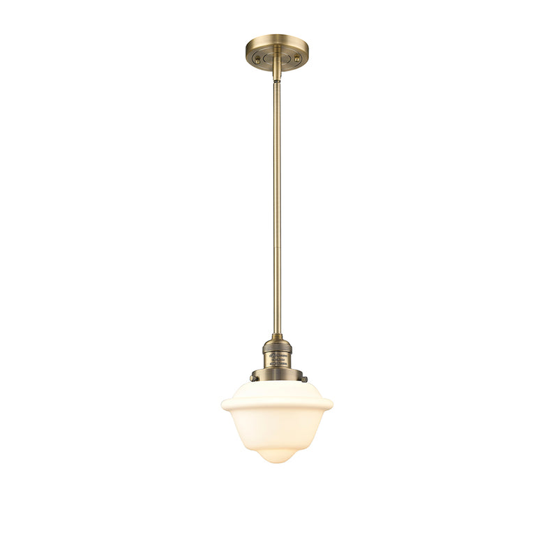 Oxford Mini Pendant shown in the Brushed Brass finish with a Matte White shade