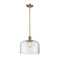 Bell Mini Pendant shown in the Brushed Brass finish with a Clear shade