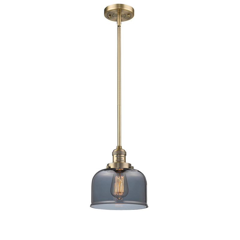 Bell Mini Pendant shown in the Brushed Brass finish with a Plated Smoke shade