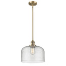 Bell Mini Pendant shown in the Brushed Brass finish with a Seedy shade