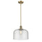 Bell Mini Pendant shown in the Brushed Brass finish with a Seedy shade