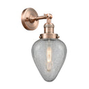 Geneseo Sconce shown in the Antique Copper finish with a Clear Crackled shade