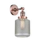 Stanton Sconce shown in the Antique Copper finish with a Clear Wire Mesh shade