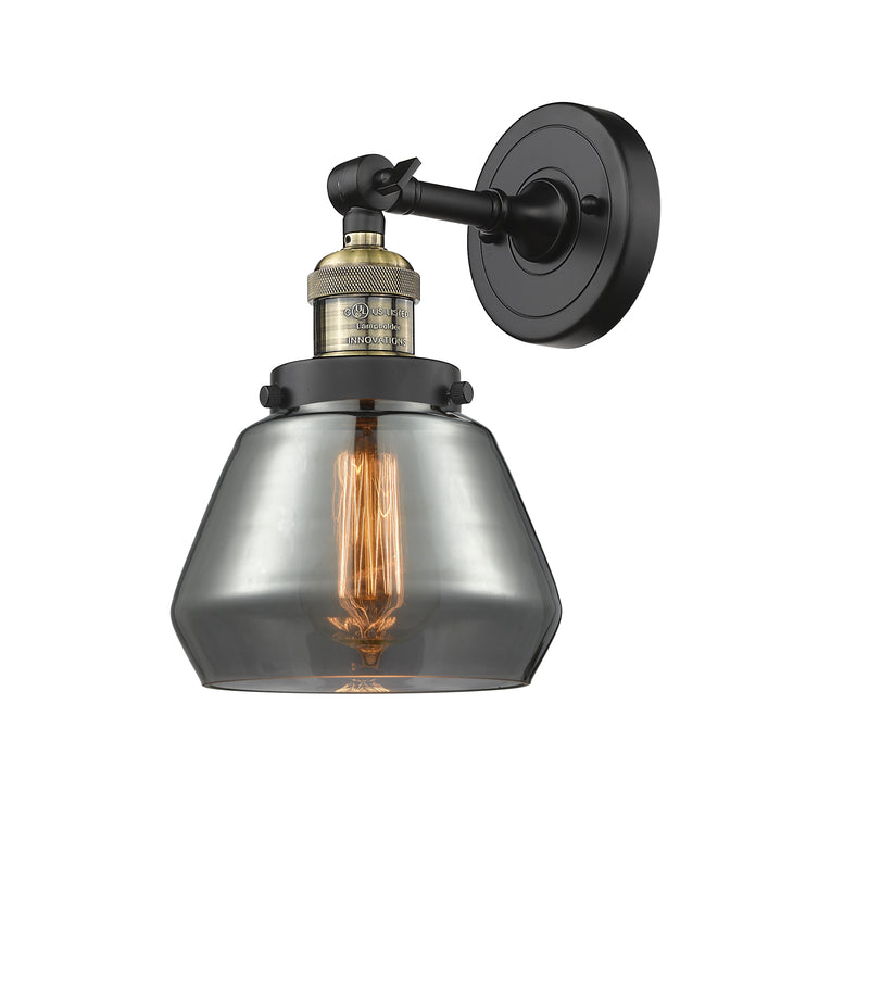 Innovations Lighting Fulton 1-100 watt 7 inch Black Antique Brass Sconce with Smoked glass and Solid Brass 180 Degree Adjustable Swivel With Engraved Cast Cup 203BABG173