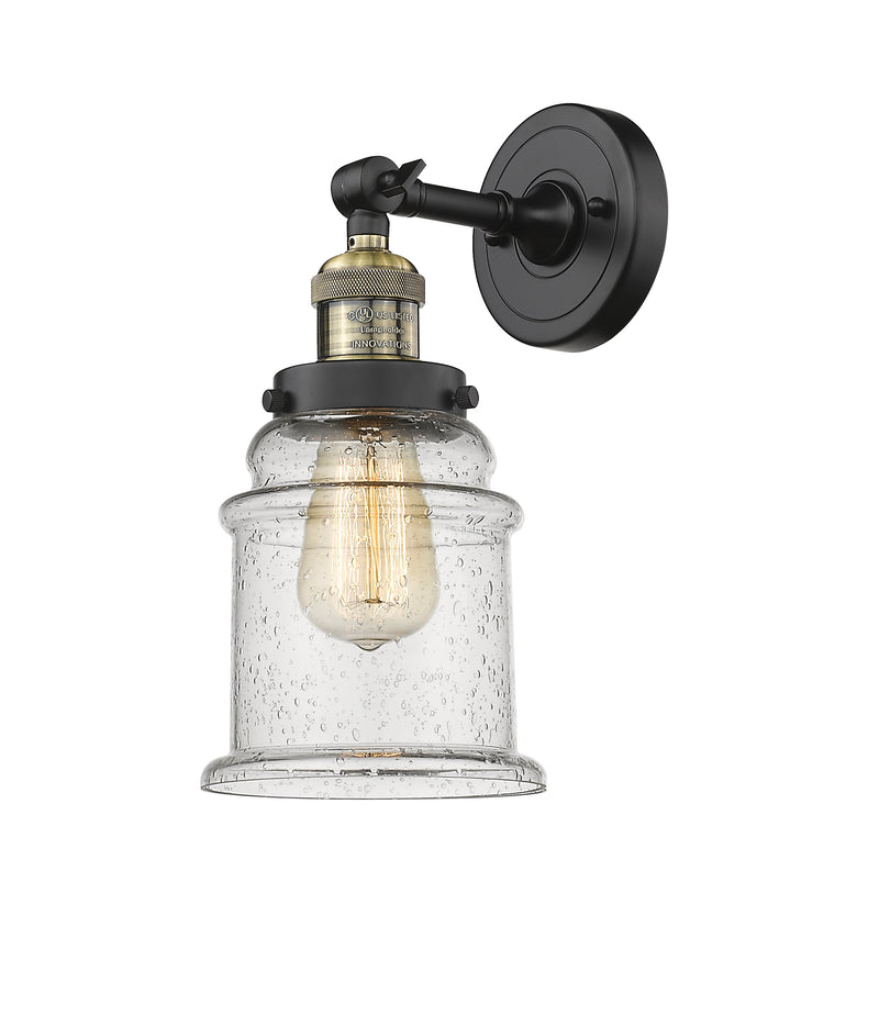 Innovations Lighting Canton 1-100 watt 6.5 inch Black Antique Brass Sconce with Seedy glass and Solid Brass 180 Degree Adjustable Swivel With Engraved Cast Cup 203BABG184