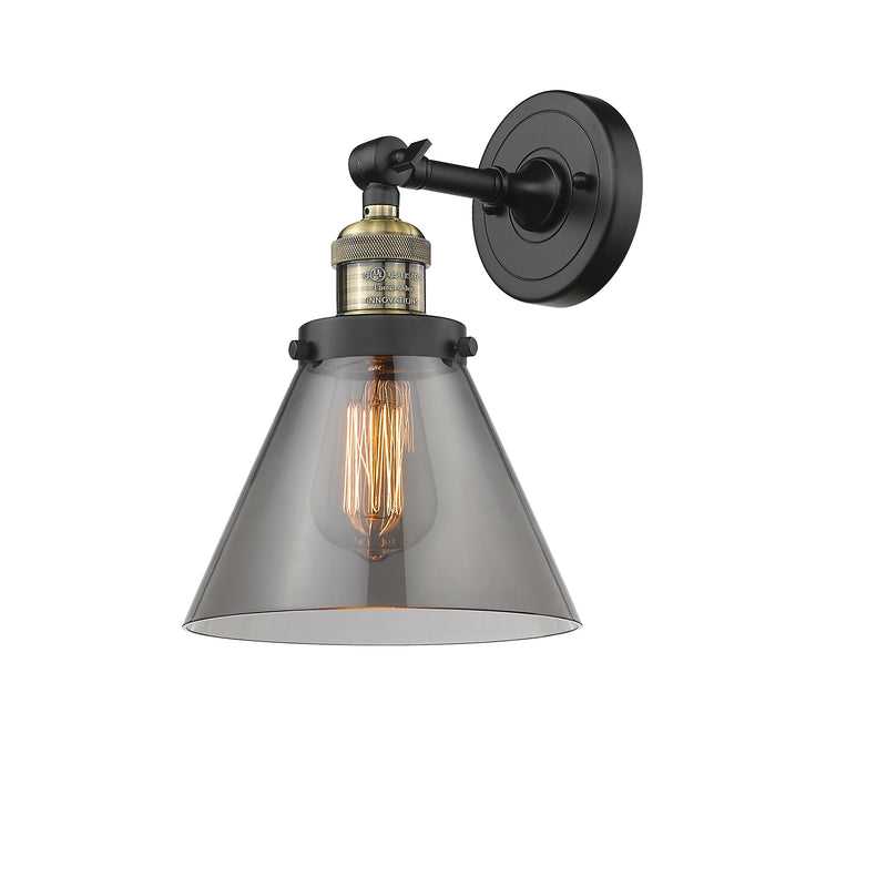 Cone Sconce shown in the Black Antique Brass finish with a Plated Smoke shade