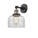 Bell Sconce shown in the Black Antique Brass finish with a Clear shade