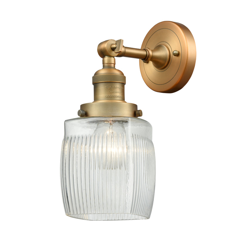 Colton Sconce shown in the Brushed Brass finish with a Clear Halophane shade