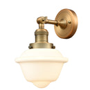 Oxford Sconce shown in the Brushed Brass finish with a Matte White shade