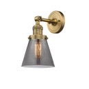 Cone Sconce shown in the Brushed Brass finish with a Plated Smoke shade